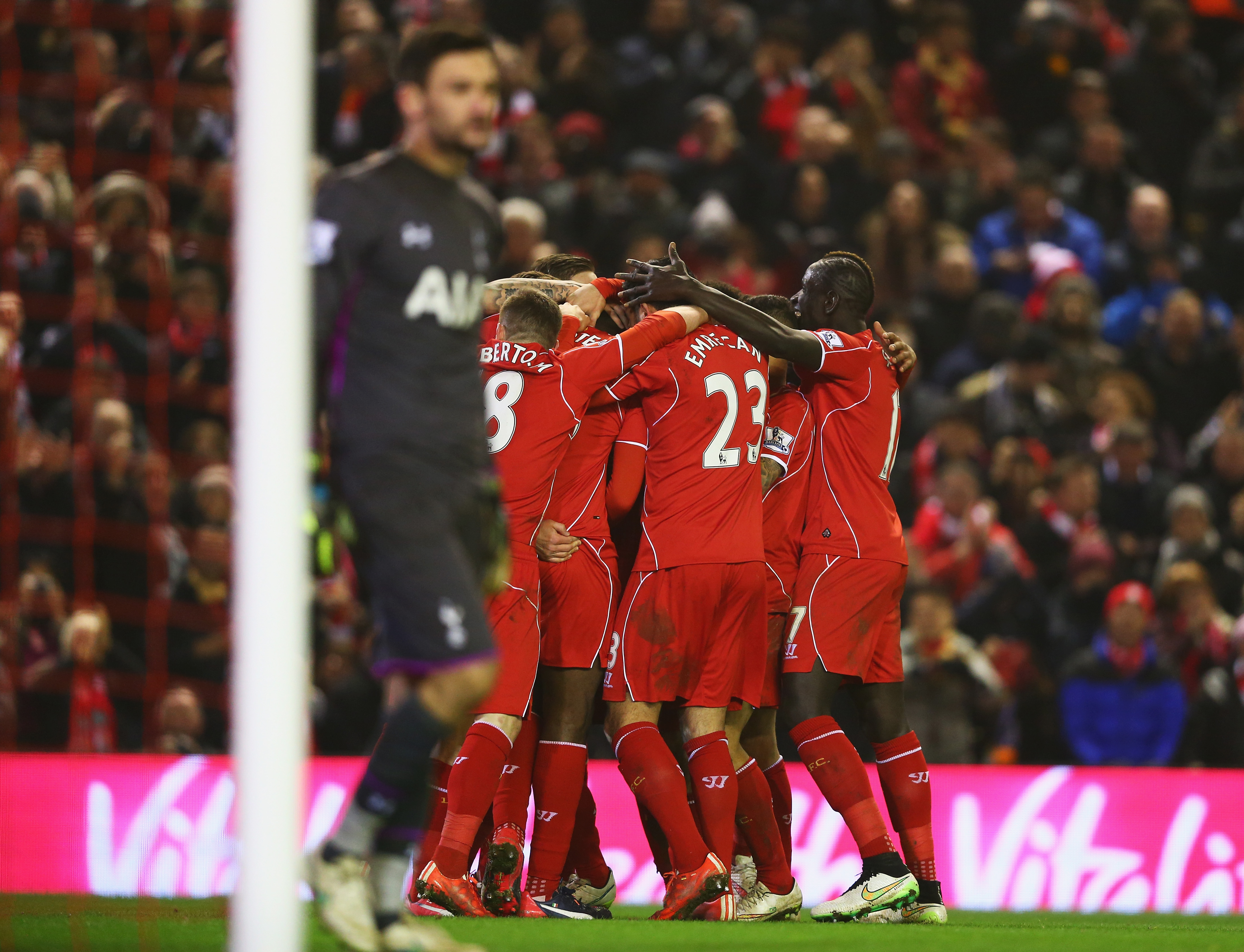 Balotelli was completely mobbed by his team mates after the goal went in. (Getty)