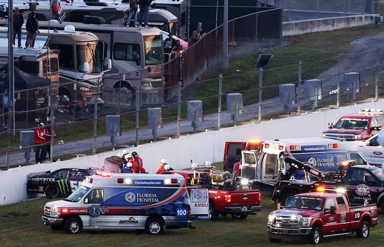 Ambulances are on the scene after Kyle Busch crashed in Saturday's Xfinity Series race at Daytona International Speedway. (Getty)