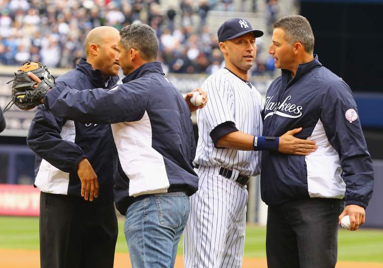 Retired players Mariano Rivera, Andy Pettitte and Jorge Posada greetr Derek Jeter during his final Opening Day as an active player. (Getty)