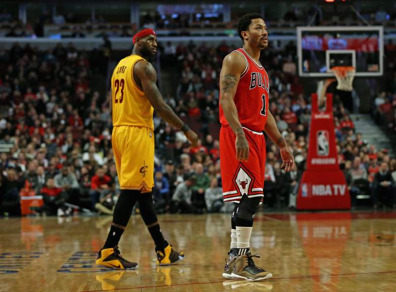 Rose on the court with LeBron James during a 2014-15 regular season game against the Cleveland Cavaliers. (Getty)
