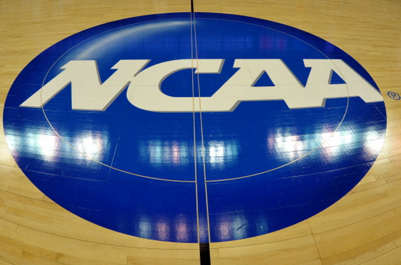 A view of the NCAA logo during the Second Round of the 2014 NCAA Basketball Tournament at PNC Arena on March 21, 2014 in Raleigh, North Carolina. (Getty)