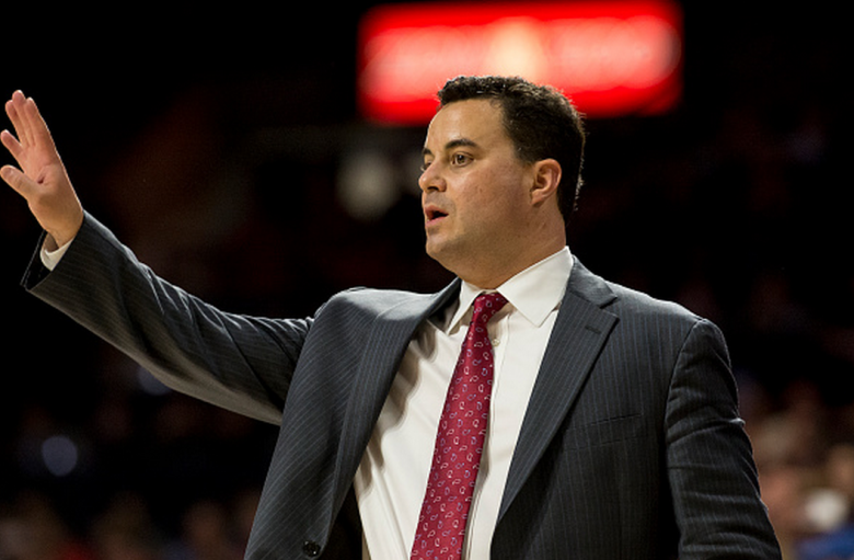 Head coach Sean Miller of the Arizona Wildcats calls a play during the second half of the college basketball game at McKale Center on December 13, 2014 in Tucson, Arizona. (Getty)
