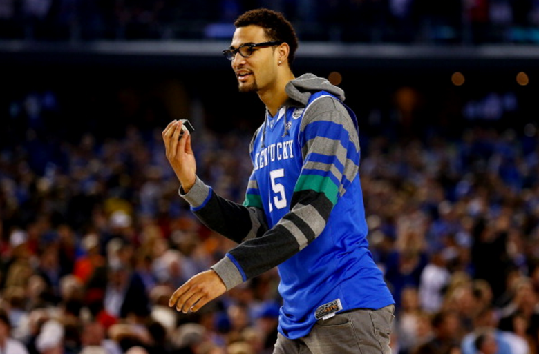 Injured Willie Cauley-Stein #15 of the Kentucky Wildcats walks on the court after defeating the Wisconsin Badgers 74-73 in the NCAA Men's Final Four Semifinal at AT&T Stadium on April 5, 2014 in Arlington, Texas. (Getty)