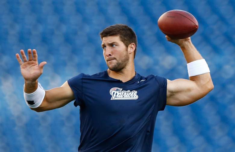 Tim Tebow has been training with Tom Brady's personal quarterback coach. (Getty)
