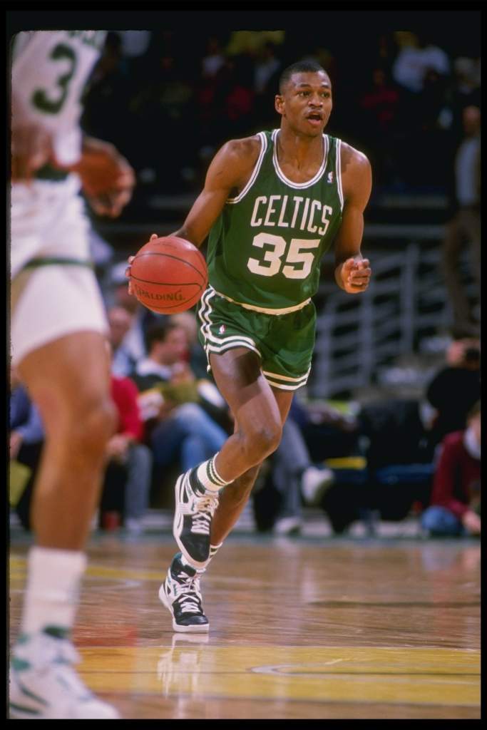 Former Northeastern and Celtics star Reggie Lewis died suddenly at 27 after suffering cardiac arrest. (Getty)
