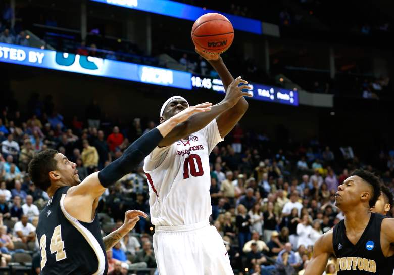 Lee Skinner #34 of the Wofford Terriers hits Bobby Portis #10 of the Arkansas Razorbacks during the second round of the 2015 NCAA Men's Basketball Tournament. (Getty)