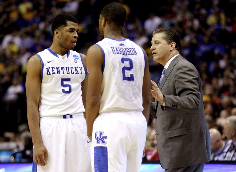 Andrew and Aaron Harrison speak to Kentucky head coach John Calipari. (Getty)