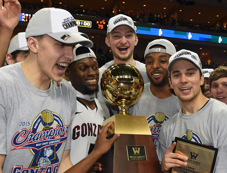 Kyle Wiltjer #33, Gary Bell Jr. #5, Domantas Sabonis #11, Byron Wesley #22 and Kevin Pangos #4 of the Gonzaga Bulldogs celebrate with the trophy after defeating the Brigham Young Cougars 91-75 to win the championship game of the West Coast Conference Basketball tournament at the Orleans Arena on March 10, 2015 in Las Vegas, Nevada. (Getty)