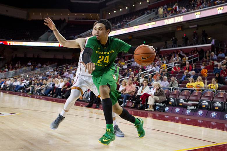 Dillon Brooks #24 of the Oregon Ducks drives to the basket against Katin Reinhardt #1 of the USC Trojans during the second period at Galen Center on February 11, 2015 in Los Angeles, California. (Getty)