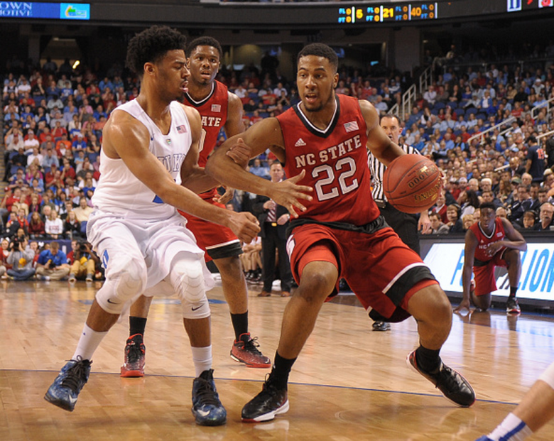 Ralston Turner #22 of the North Carolina State Wolfpack dribbles against Quinn Cook #2 of the Duke Blue Devils during the quarterfinals of the 2015 Men's ACC Tournament at the Greensboro Coliseum on March 12, 2015 in Greensboro, North Carolina. (Getty)