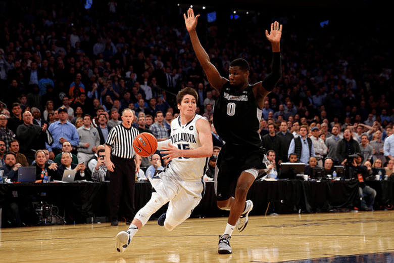 Ryan Arcidiacono #15 of the Villanova Wildcats drives to the basket against Ben Bentil #0 of the Providence Friars during a semifinal game of the Big East basketball tournament at Madison Square Garden on March 13, 2015 in New York City. (Getty)