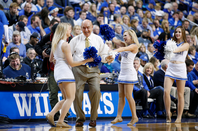 ESPN basketball analyst Dick Vitale dances with Kentucky Wildcats cheerleaders during the game against the Missouri Tigers at Rupp Arena on January 13, 2015 in Lexington, Kentucky. Kentucky defeated Missouri 86-37. (Getty)