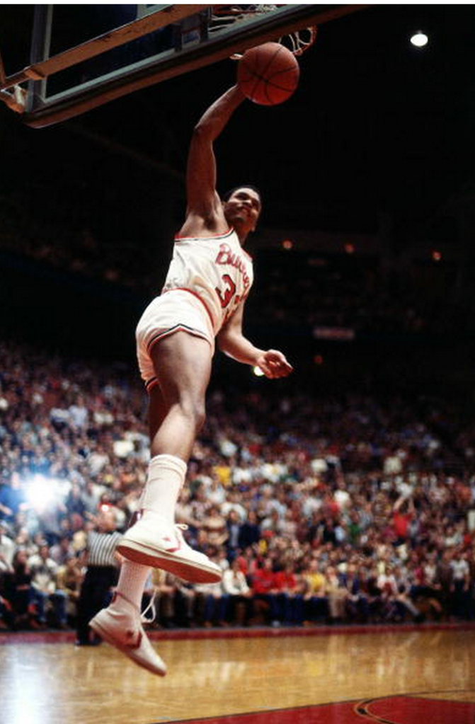 1980: Clark Kellogg #33 of the Ohio State University Buckeyes goes up for a slam dunk during an NCAA game in 1980 at Buckeye Lake, Ohio. NOTE TO USER: User expressly acknowledges and agrees that, by downloading and/or using this Photograph, User is consenting to the terms and conditions of the Getty Images License Agreement. Mandatory Copyright Notice: Copyright 1980 NBAE (Getty)