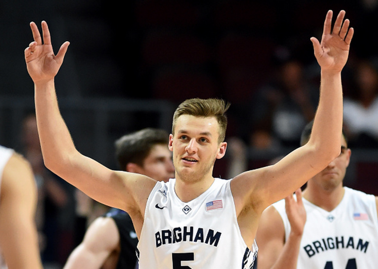 Kyle Collinsworth #5 of the Brigham Young Cougars reacts after tying the NCAA career record for triple-doubles with six, all coming this season, during a semifinal game of the West Coast Conference Basketball tournament at the Orleans Arena on March 9, 2015 in Las Vegas, Nevada. Brigham Young won 84-70. (Getty)