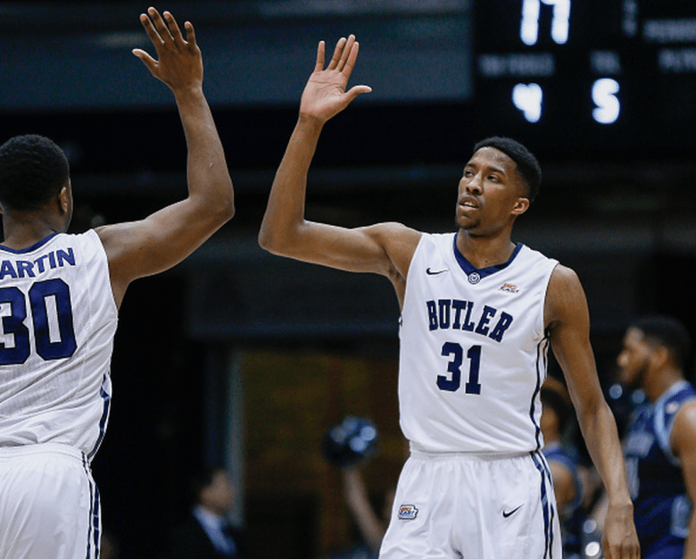 Kelan Martin #30 of the Butler Bulldogs high fives with Kameron Woods #31 of the Butler Bulldogs during the game against the Georgetown Hoyas at Hinkle Fieldhouse on March 3, 2015 in Indianapolis, Indiana. (Getty)