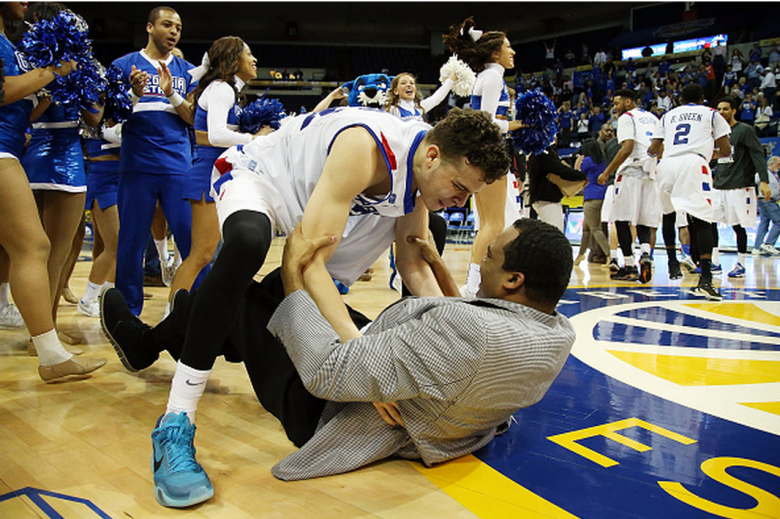 R.J. Hunter #22 of the Georgia State Panthers celebrates with his father head coach Ron Hunter of the Georgia State Panthers after defeating the Georgia Southern Eagles to win the Sun Belt Conference Men's Championship game at the UNO Lakefront Arena on March 15, 2015 in New Orleans, Louisiana. (Getty)