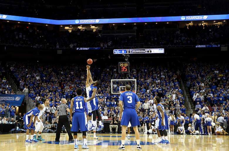 The opening tipoff between the Kentucky Wildcats and the Hampton Pirates during the second round of the 2015 NCAA Men's Basketball Tournament at the KFC YUM! Center on March 19, 2015 in Louisville, Kentucky. (Getty)