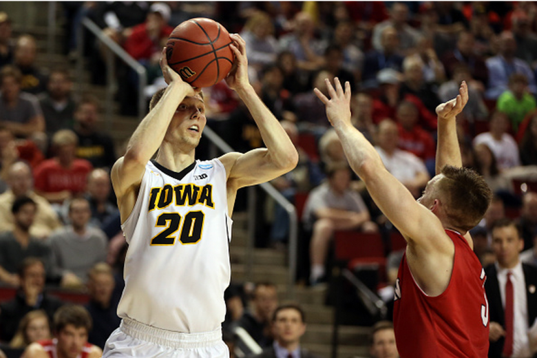 Jarrod Uthoff #20 of the Iowa Hawkeyes shoots the ball against Brian Sullivan #3 of the Davidson Wildcats during the second round of the 2015 NCAA Men's Basketball Tournament at KeyArena on March 20, 2015 in Seattle, Washington. (Getty)