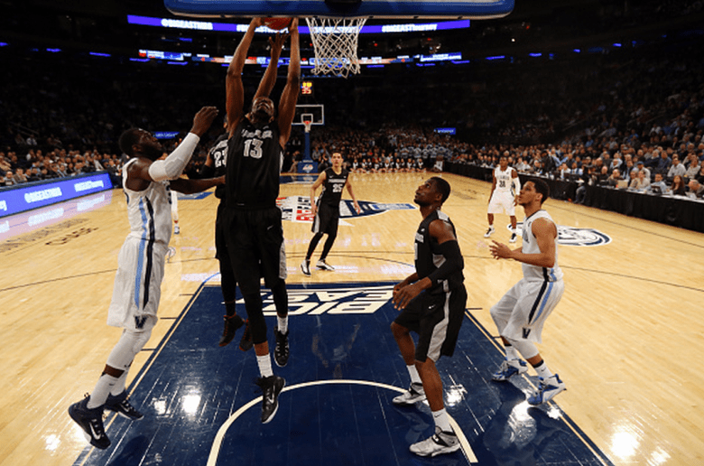 Paschal Chukwu #13 of the Providence Friars goes up for a rebound against the Villanova Wildcats during a semifinal game of the Big East basketball tournament at Madison Square Garden on March 13, 2015 in New York City. (Getty)