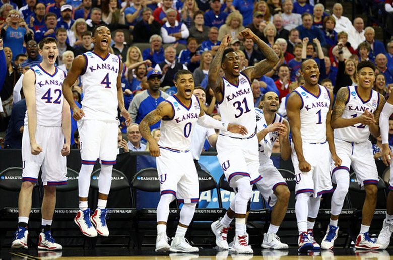 The Kansas Jayhawks bench reacts in the closing minutes against the New Mexico State Aggies during the second round of the 2015 NCAA Men's Basketball Tournament at the CenturyLink Center on March 20, 2015 in Omaha, Nebraska. (Getty)