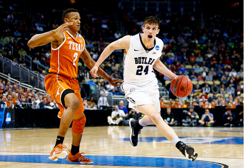 Kellen Dunham #24 of the Butler Bulldogs drives against Demarcus Holland #2 of the Texas Longhorns in the second half during the second round of the 2015 NCAA Men's Basketball Tournament at Consol Energy Center on March 19, 2015 in Pittsburgh, Pennsylvania. (Getty)