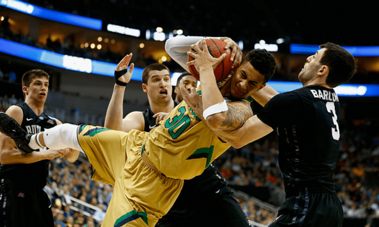 Notre Dame's Zach Auguste and Butler's Alex Barlow go after the ball in the 2015 NCAA Men's Basketball Tournament. (Getty)