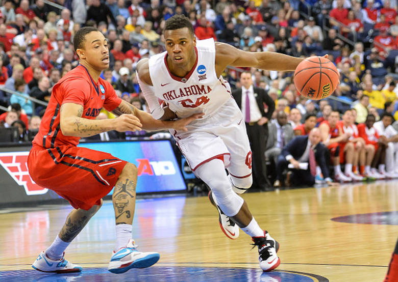 Oklahoma's Buddy Hield controls the ball against the Dayton Flyers during the 2015 NCAA Men's Basketball Tournament. (Getty)