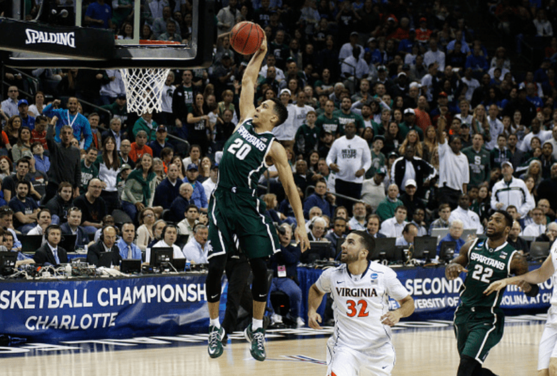 Michigan State's Travis Trice drives to the basket against the Virginia Cavaliers during the 2015 NCAA Men's Basketball Tournament. (Getty)