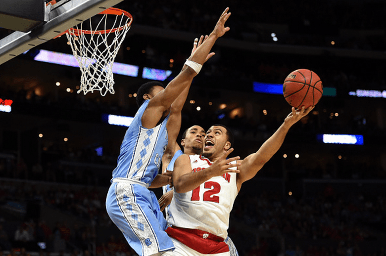 Wisconsin's Traevon Jackson goes up for a shot against North Carolina's Joel Berry II in the 2015 NCAA Men's Basketball Tournament. (Getty)