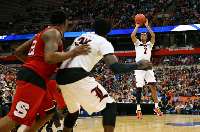 Louisville's Quentin Snider shoots the ball in against NC State during the 2015 NCAA Men's Basketball Tournament. (Getty)