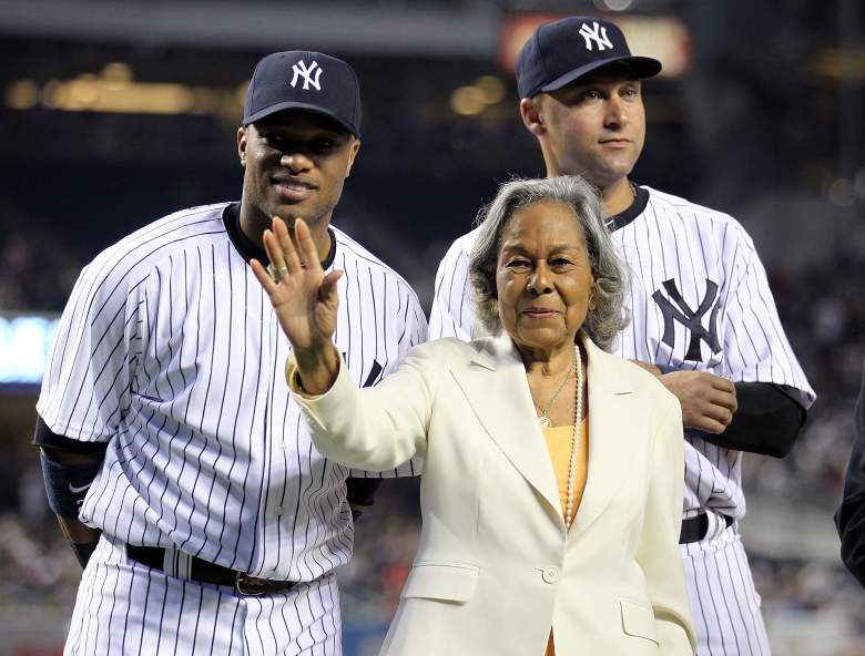 Rachel Robinson with former New York Yankee players Robinson Cano and Derek Jeter on Jackie Robinson Day in 2012.