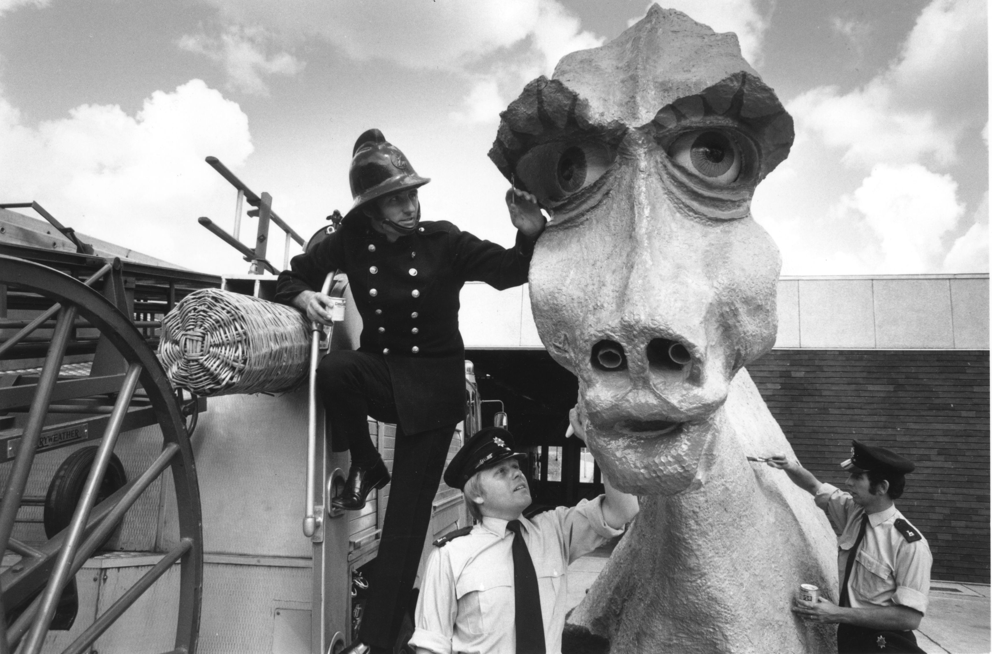 In 1975, Firemen from Hemel Hempstead, London, adding the finishing touches to a seductive female Nessie, intended to lure the Loch Ness Monster from his Scottish depths. The beautiful beast is 30ft long, 14ft high and 10ft wide and is made from oil drums and paper mache. She has an amplified mating call, can puff smoke through her nostrils, and carries a hidden camera to record the momentous meeting.  (Getty)