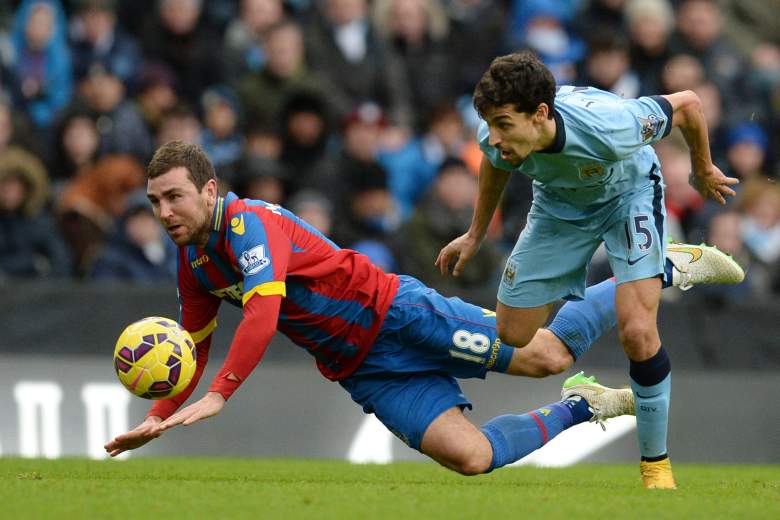 Jesus Navas (R) vies with James McArthur for a ball during a game Dec. 20. Manchester City and Crystal Palace will battle again Monday.