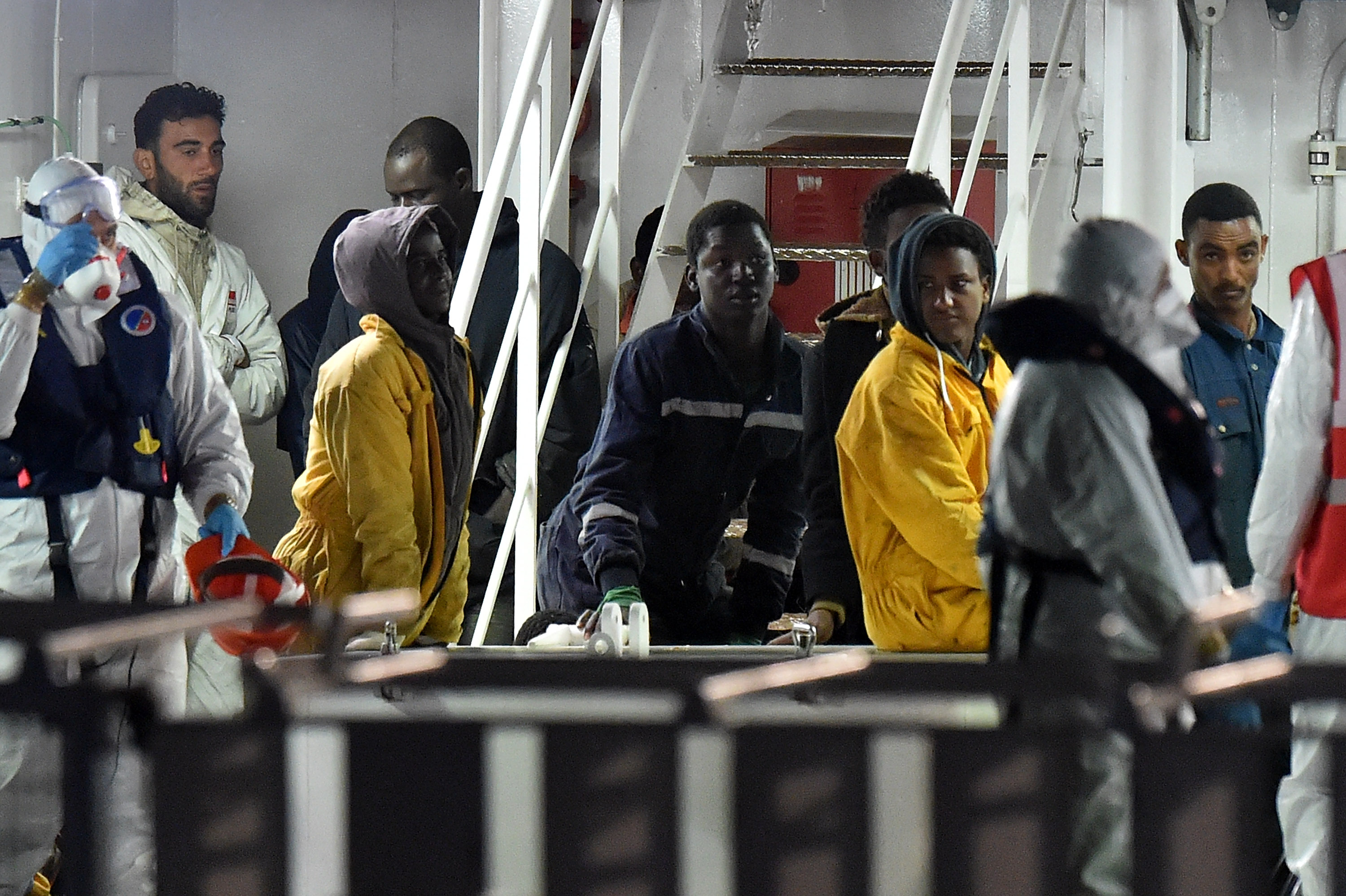 Tunisian skipper Mohammed Ali Malek stands on the deck of the Italian Coast Guard ship Gregretti which is carrying 27 survivors of the migrant shipwreck in the mediterranean, at Catania port on April 20, 2015 in Catania, Italy.  (Getty)
