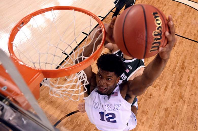 Duke's Justise Winslow goes in for the dunk against Michigan State in the Final Four during the 2015 NCAA men's basketball tournament. (Getty)