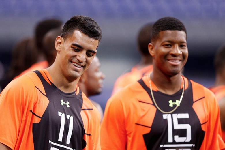 Top 2015 NFL Draft picks Jameis Winston and Marcus Mariota at the NFL Combine. (Getty)