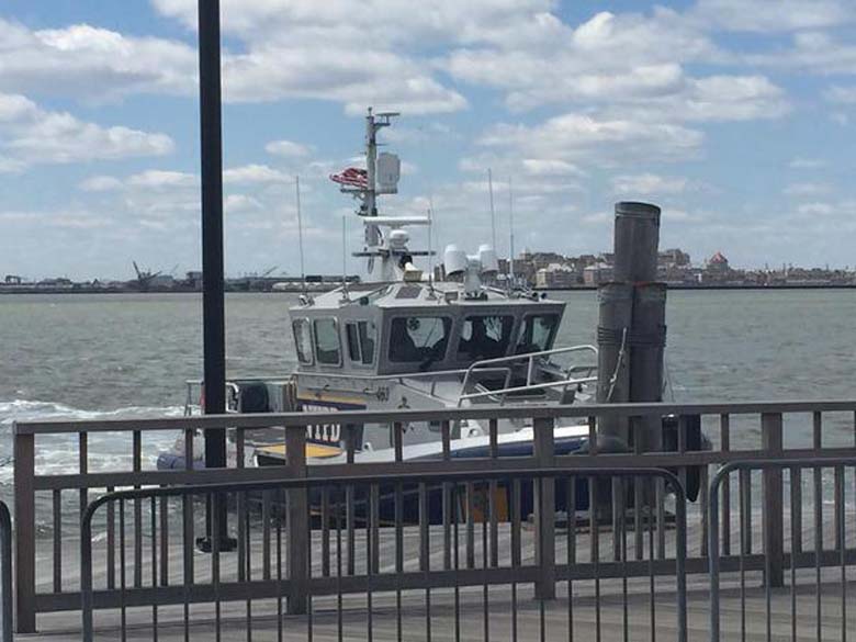 NYPD Boat arriving at Liberty Island.