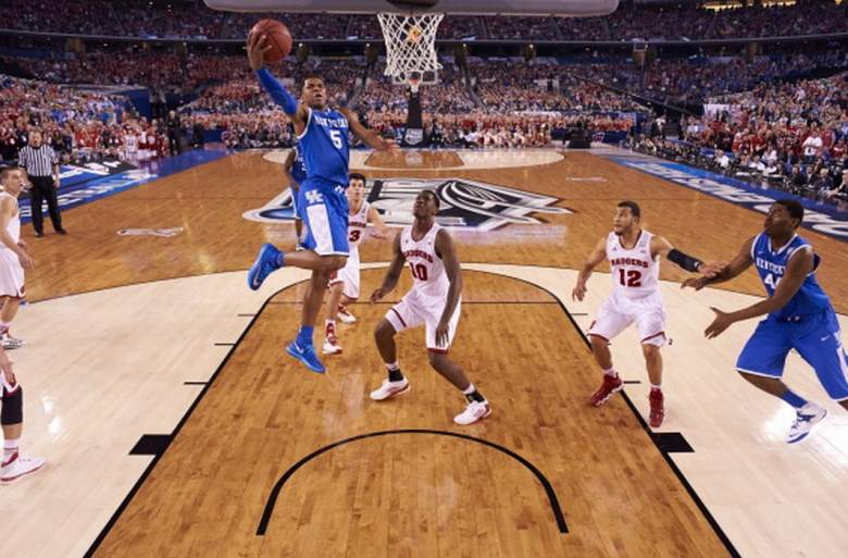 Kentucky's Andrew Harrison goes up for a shot against Wisconsin in the Final Four of the 2014 NCAA Men's Basketball Tournament. (Getty)