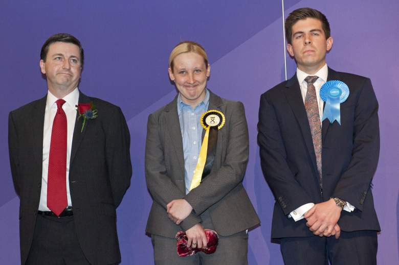 Black stands with Labour candidate Douglas Alexander (L) and Fraser Galloway, Conservative Candidate as they wait for the declaration of the general election results. (Getty)
