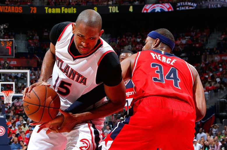 Al Horford of the Hawks gets fouled by Washington's Paul Pierce in Game 5. (Getty)