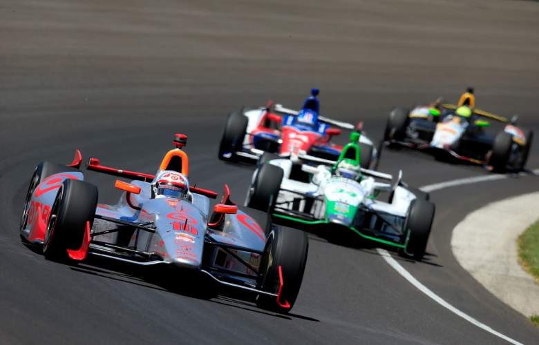 Tony Kanaan leads a pack of drivers during the 2014 Indy 500. (Getty)