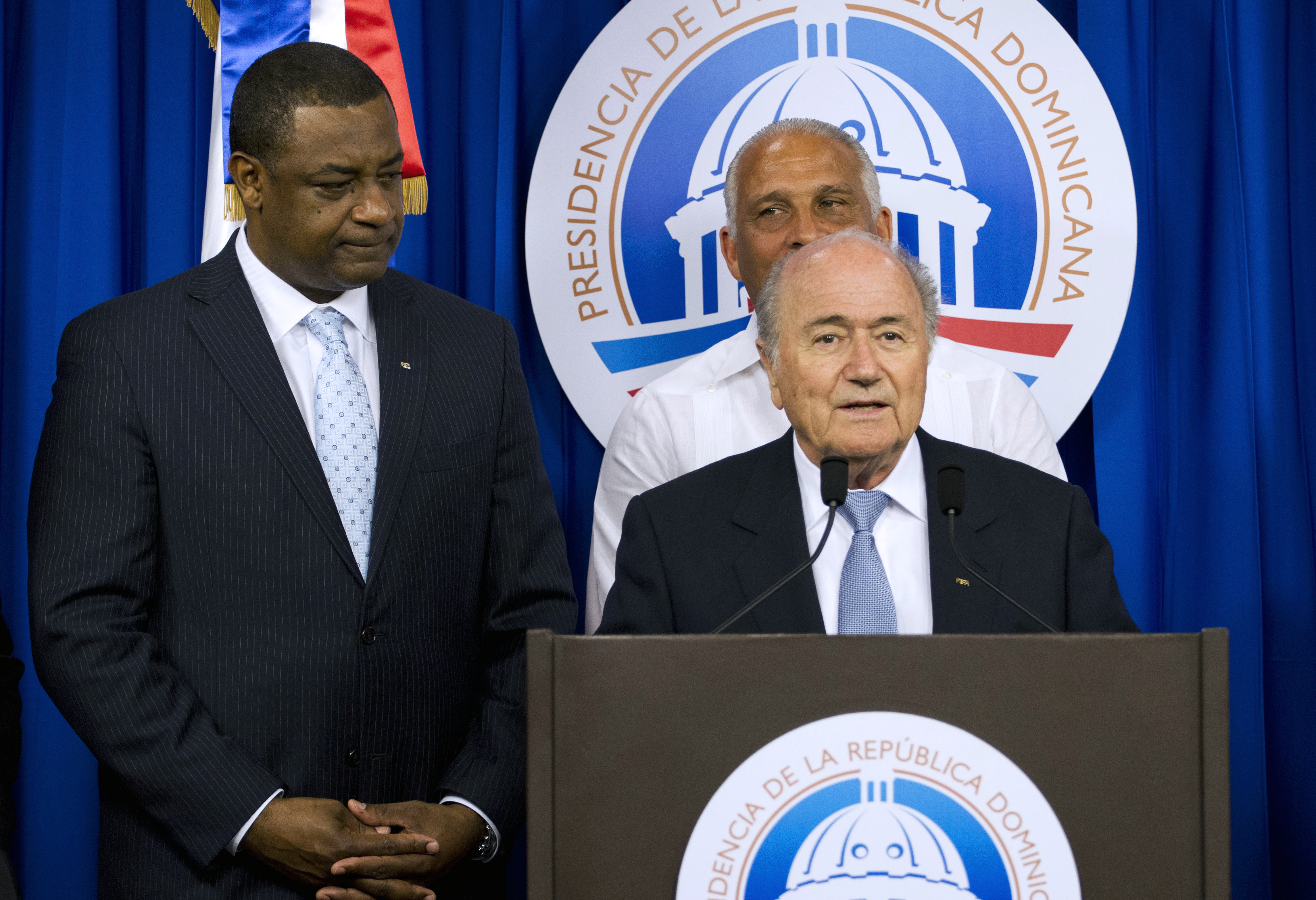 Webb with FIFA President Sepp Blatter at a press conference. Getty