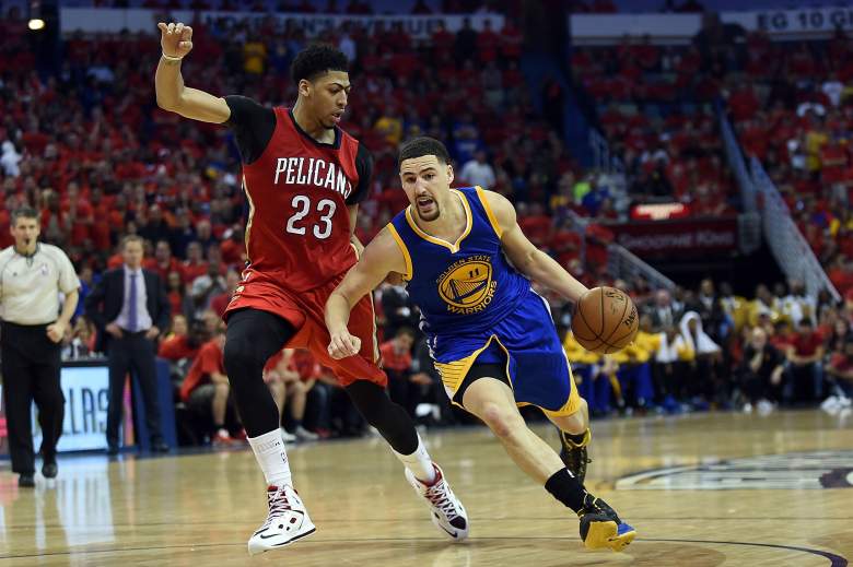 Klay Thompson dribbles around New Orleans Pelicans' Anthony Davis in the 2015 NBA Playoffs. (Getty)