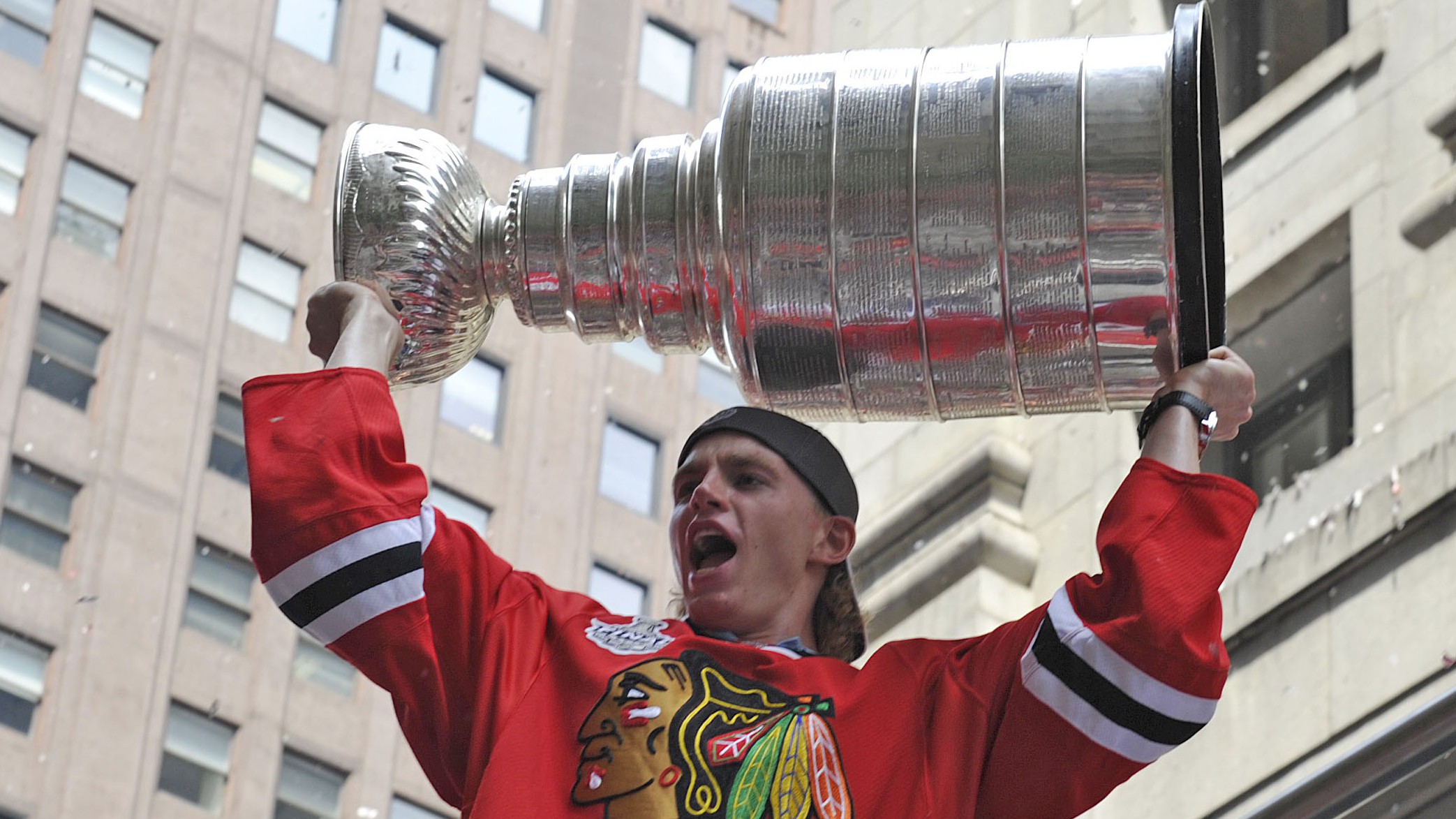 Jun 11, 2010 - Chicago, Illinois, U.S. - Fan carries fake Stanley cup on  Wacker Drive. Parade on Michigan Avenue to celebrate the Stanley Cup 2010  championship win of the Chicago Blackhawks