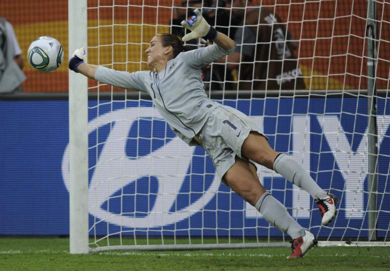USA's goalkeeper Hope Solo saves a penalty kick shot by Brazil's defender Daiane (not in picture) during the quarter-final match of the FIFA women's football World Cup Brazil vs USA on July 10, 2011 in Dresden, eastern Germany. The USA won the match after a penalty shoot-out. AFP PHOTO / ODD ANDERSEN (Photo credit should read ODD ANDERSEN/AFP/Getty Images)