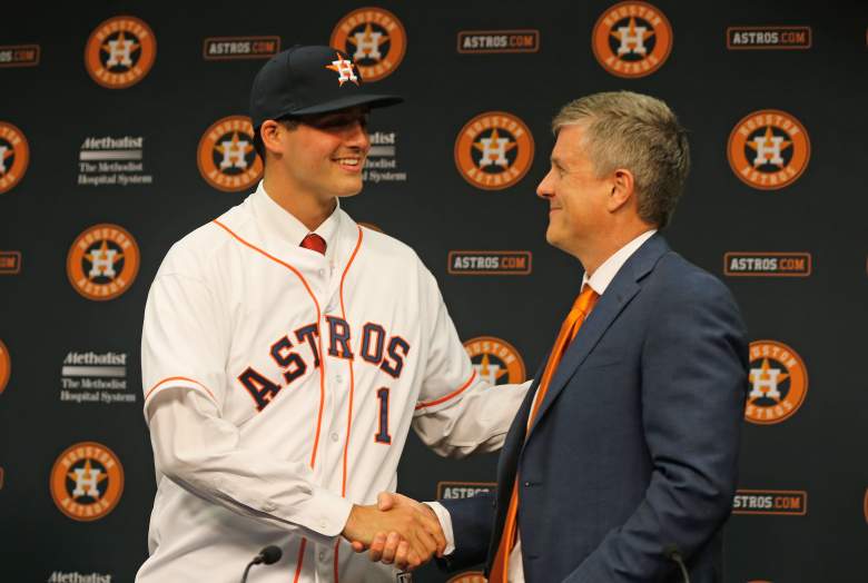HOUSTON, TX - JUNE 19:  Houston Astros general manager Jeff Luhnow (R) introduces first overall draft pick Mark Appel to the media after signingAppel to the team prior to the start of the game between the Milwaukee Brewers and the Houston Astros at Minute Maid Park on June 19, 2013 in Houston, Texas.  (Photo by Scott Halleran/Getty Images)