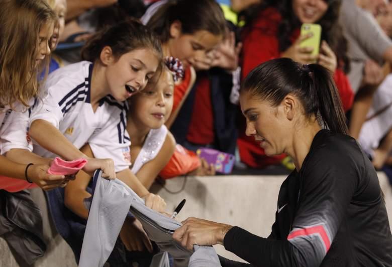SANDY, UT - SEPTEMBER 13: Goalie Hope Solo #1 of the United States signs autographs after a game against Mexico during at an international friendly soccer game September 13, 2014 at Rio Tinto Stadium in Sandy, Utah. The Unites States beat Mexico 8-0. Solo set a U.S. woman's soccer record with 72 career shutouts. (Photo by George Frey/Getty Images)