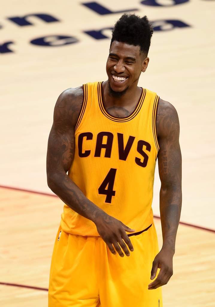 CLEVELAND, OH - MAY 26: Iman Shumpert #4 of the Cleveland Cavaliers smiles after a play in the second half against the Atlanta Hawks during Game Four of the Eastern Conference Finals of the 2015 NBA Playoffs at Quicken Loans Arena on May 26, 2015 in Cleveland, Ohio. NOTE TO USER: User expressly acknowledges and agrees that, by downloading and or using this Photograph, user is consenting to the terms and conditions of the Getty Images License Agreement.  (Photo by Jason Miller/Getty Images)