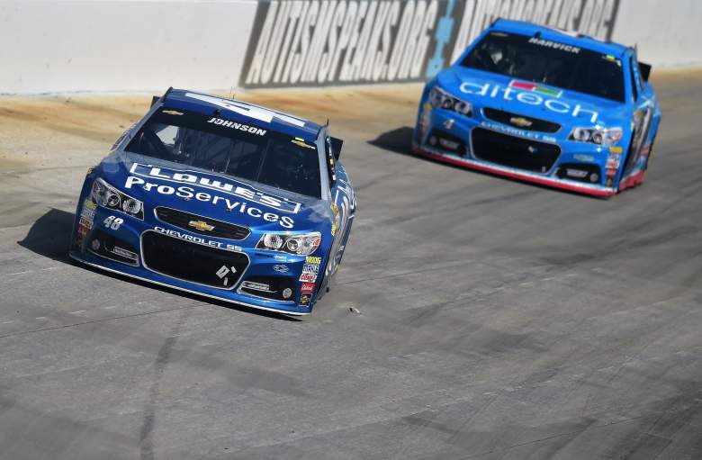 Jimmie Johnson, front, and Kevin Harvick, rear, are the favorites for Sunday's Axalta 400. (Getty)