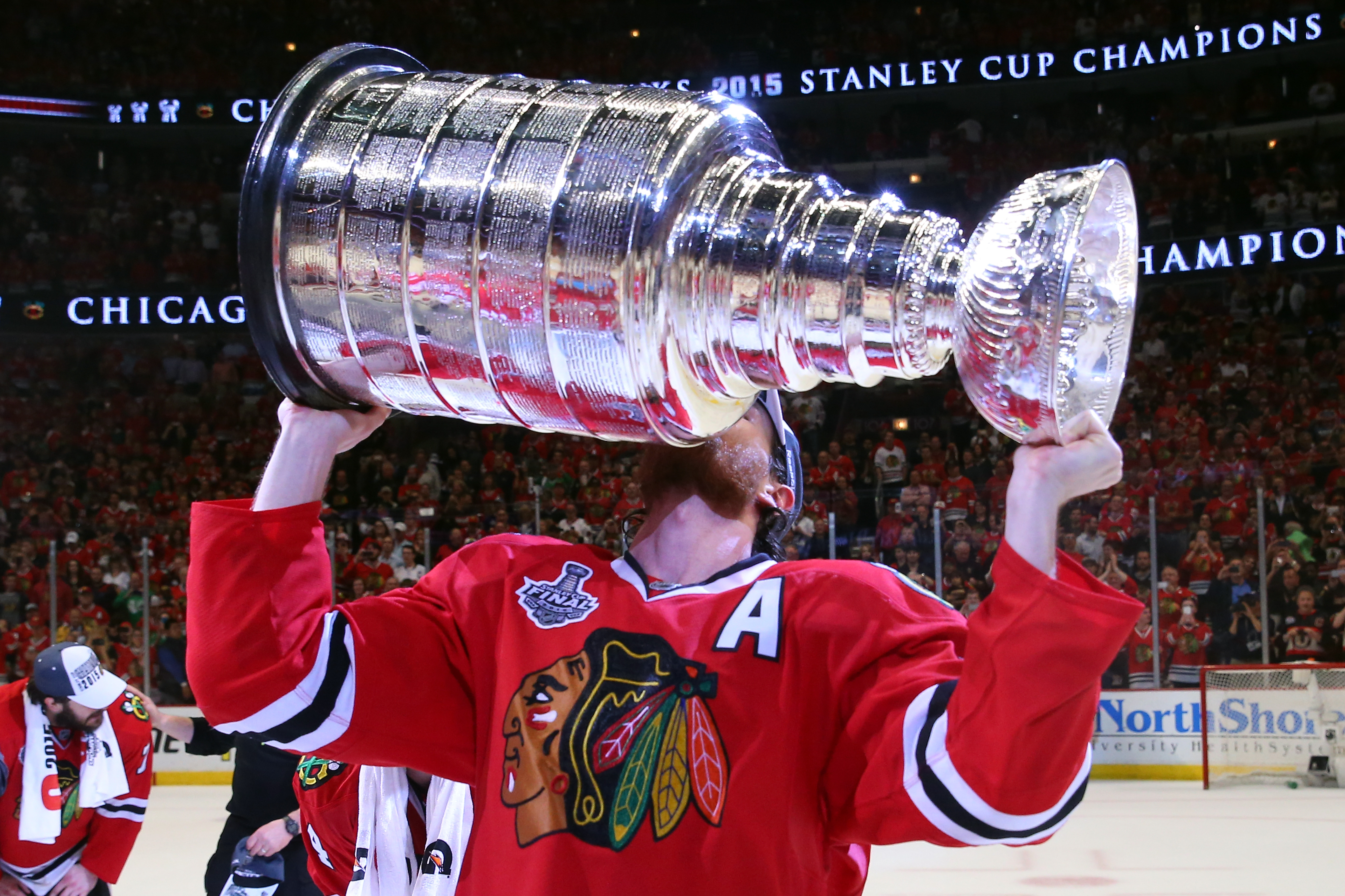 Duncan Keith of the Chicago Blackhawks celebrates by hoisting the Stanley Cup after defeating the Tampa Bay Lightning. Getty